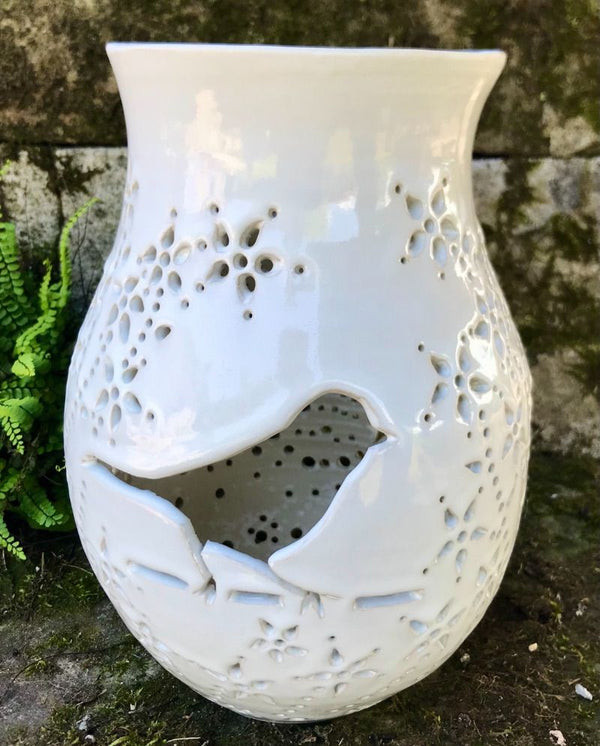Farol Pájaro blanco de Irene
